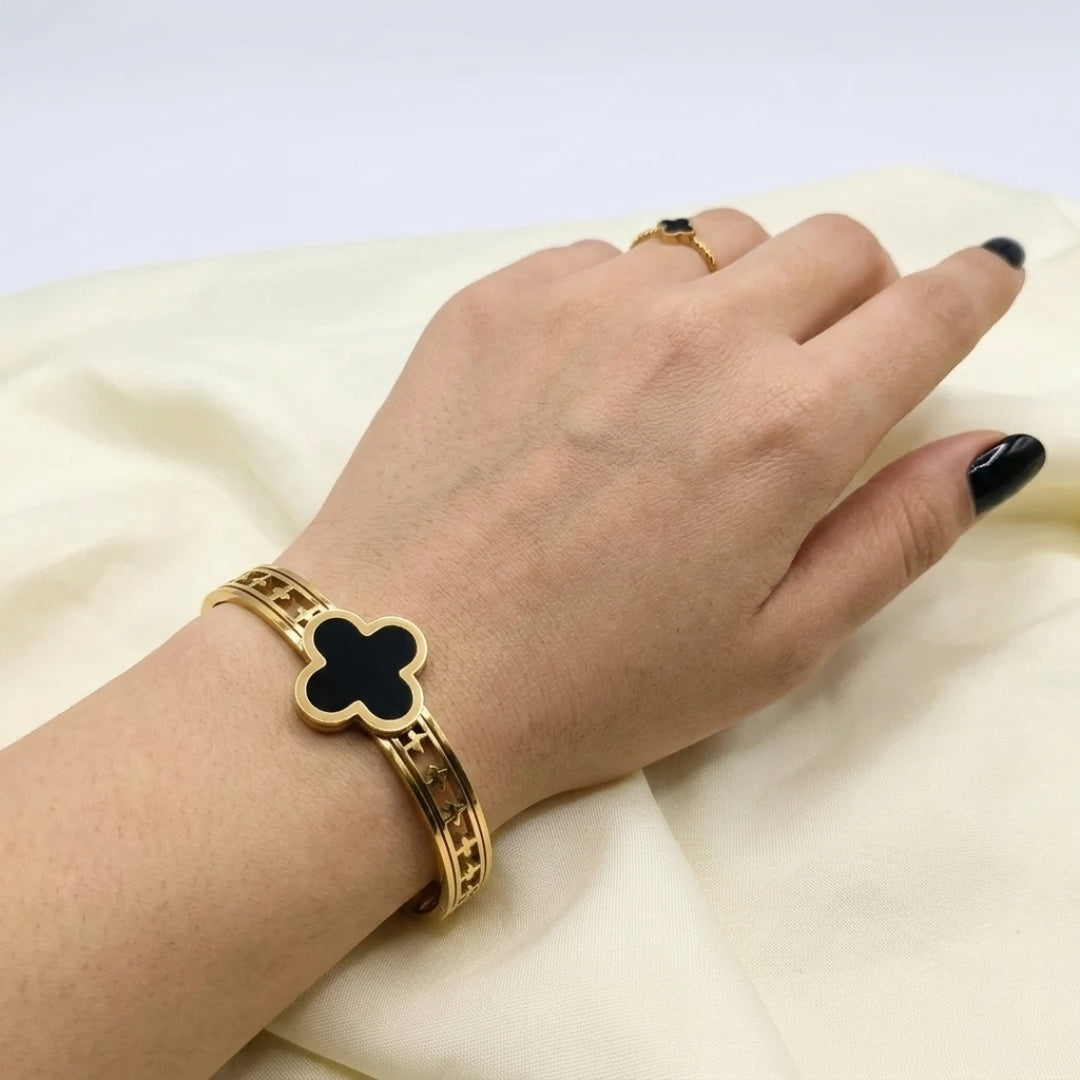 Pyari Jewellery Gold Cuff Bracelet with Black Clover Charm – Elegant Artificial Jewelry for Women